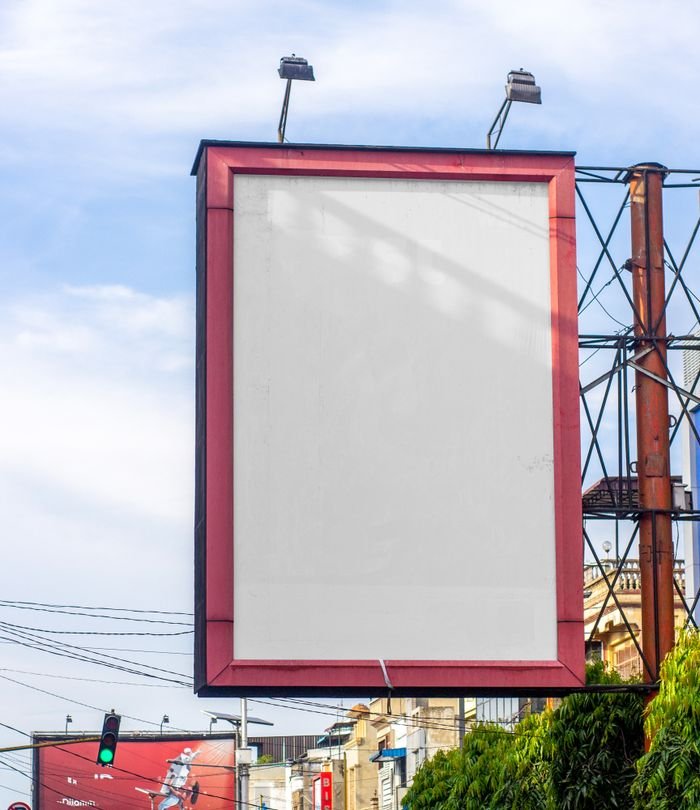 Home Blank billboard in Medan, North Sumatra, ideal for advertisements with cityscape.